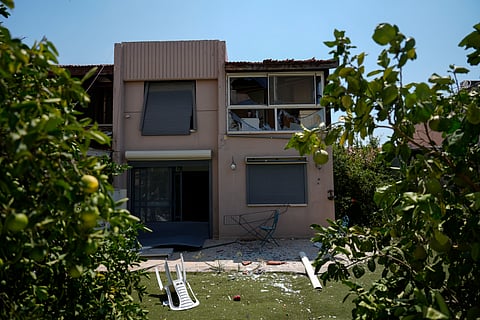 A damaged house is seen following an attack from Lebanon, in Acre, north Israel, Sunday, Aug. 25, 2024